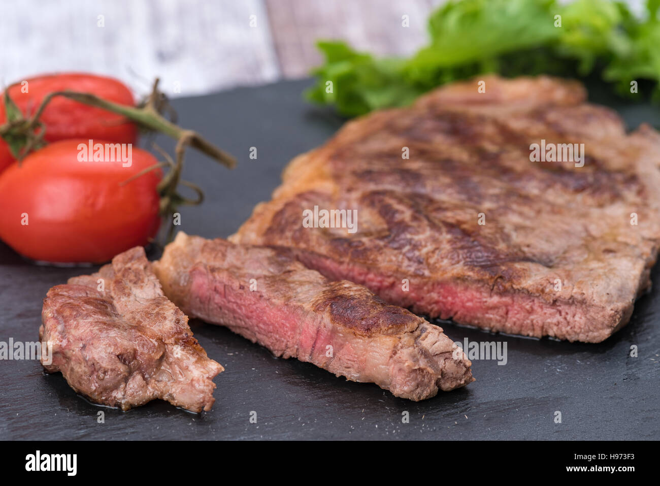 Tranche de steak de boeuf grillé Banque D'Images