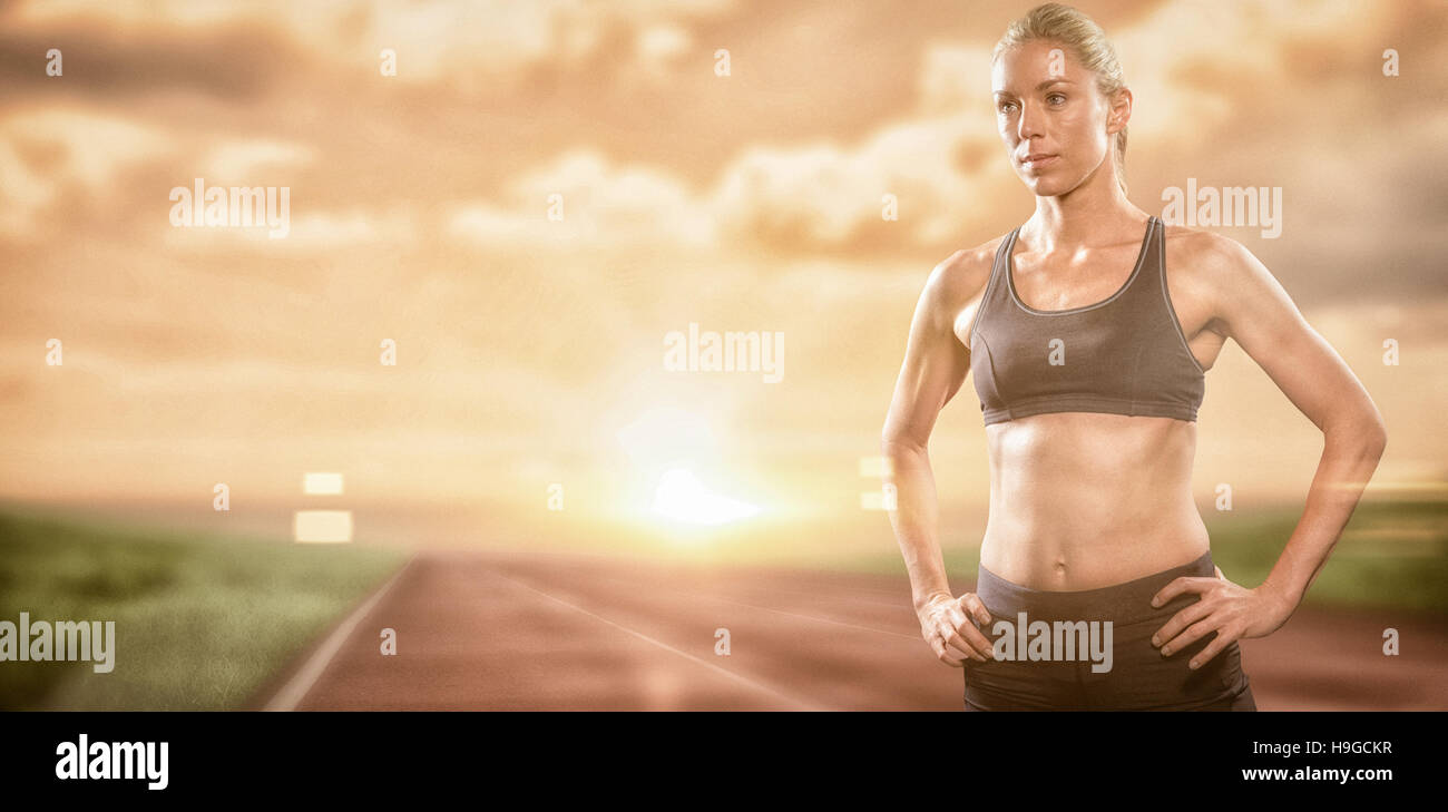 Image composite de l'athlète féminine de l'article with hand on hip Banque D'Images