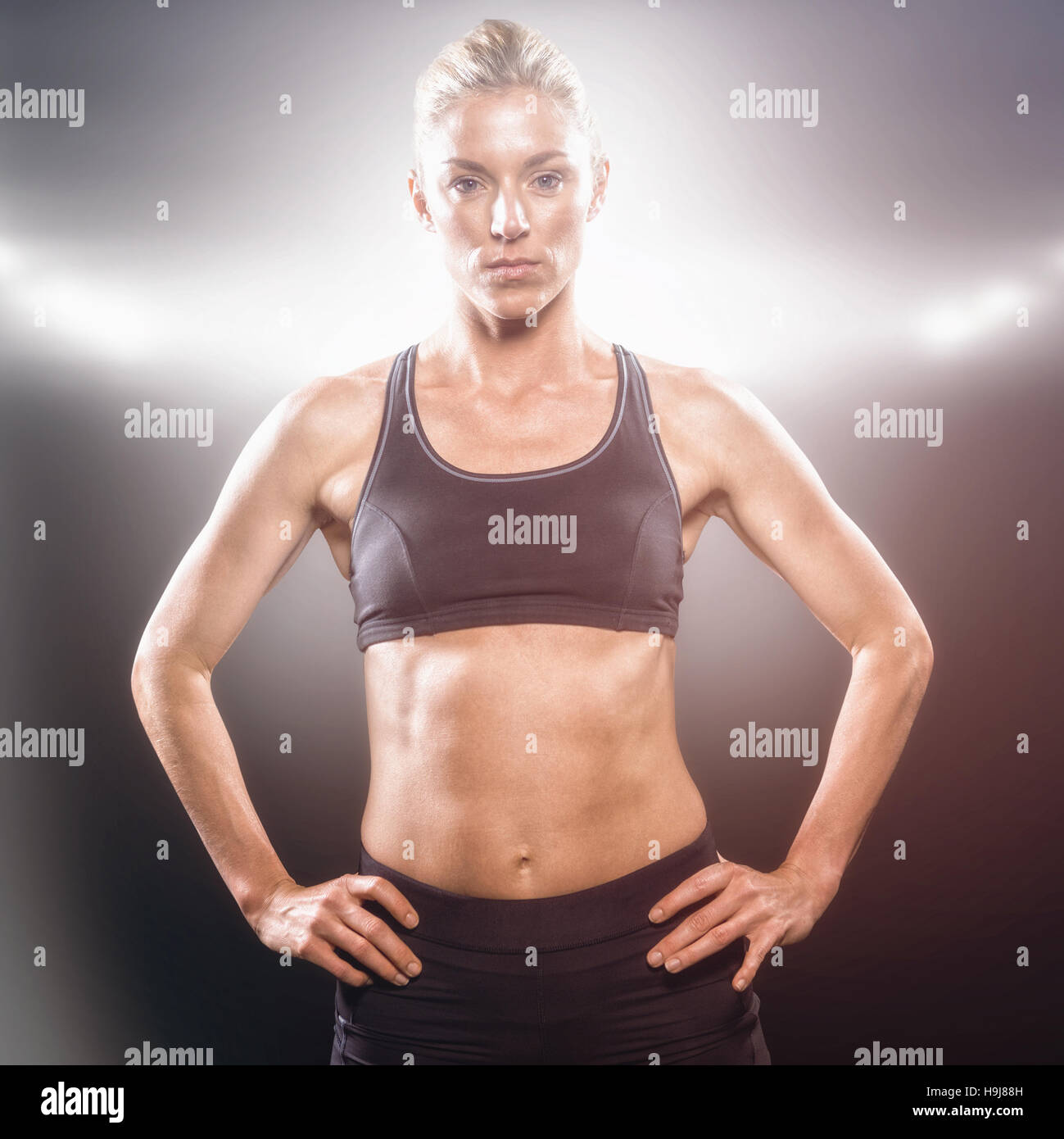 Image composite de l'athlète féminine de l'article with hand on hip Banque D'Images