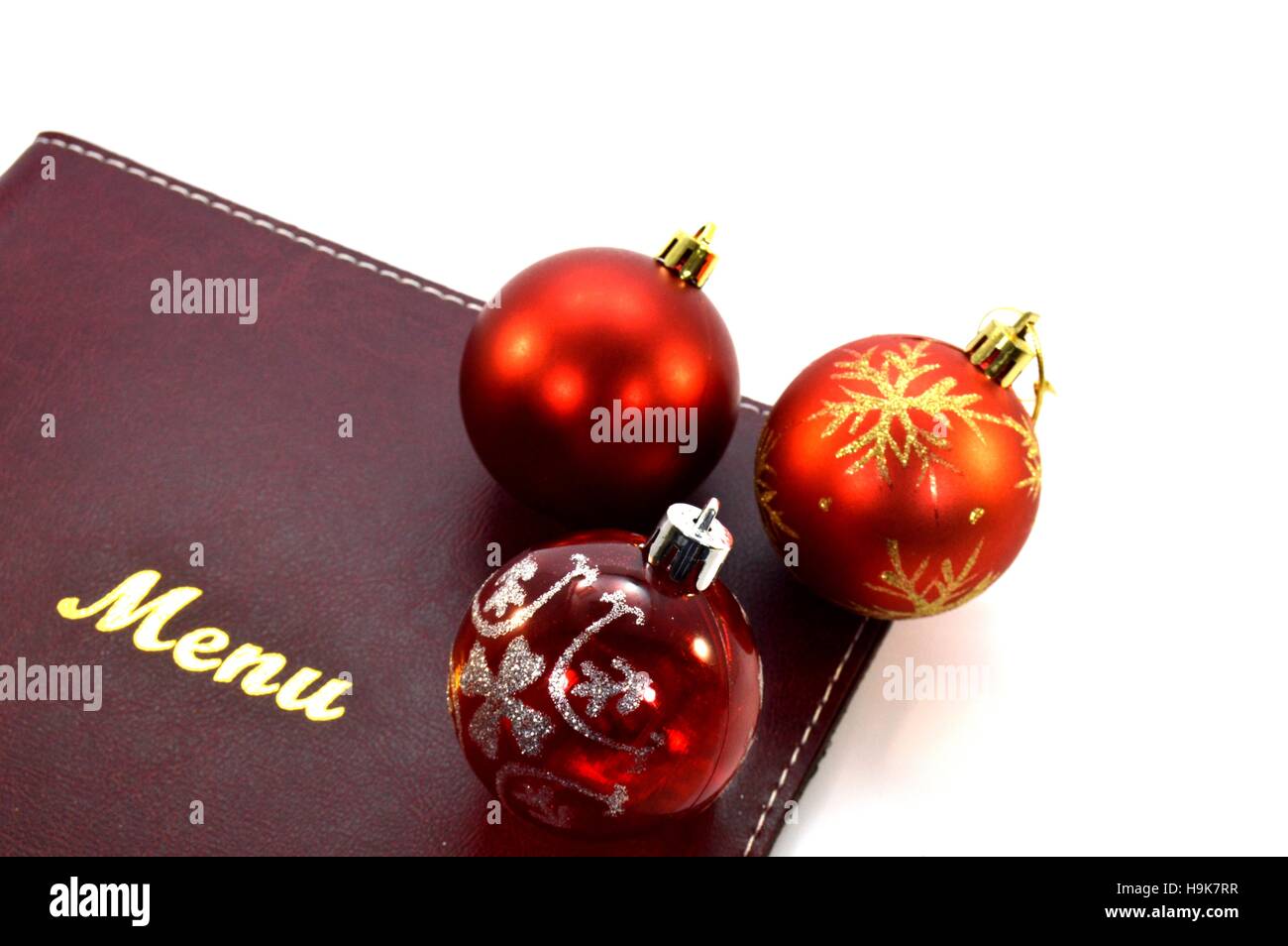 Carte des menus avec trois boules de noël sur un coin Banque D'Images