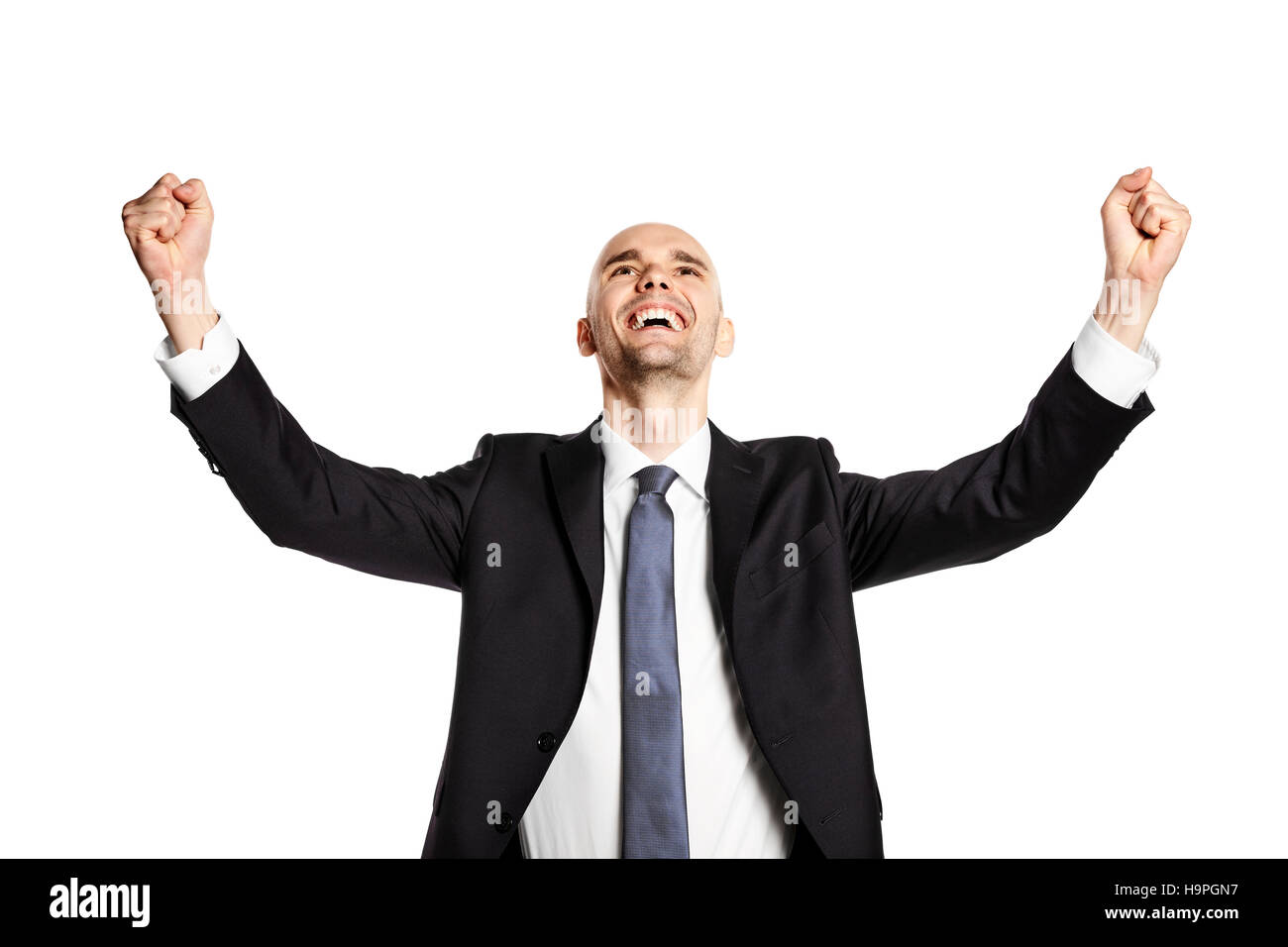 Portrait of happy young man. Il est de la recherche, faisant des gestes de la main et célèbre la victoire. Banque D'Images