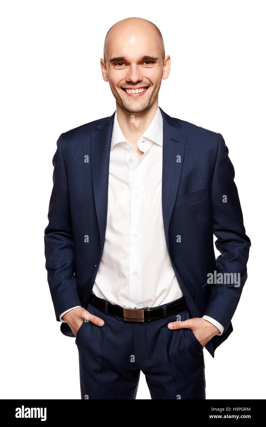 Portrait of young handsome smiling man. Studio shot isolé sur fond blanc. Banque D'Images