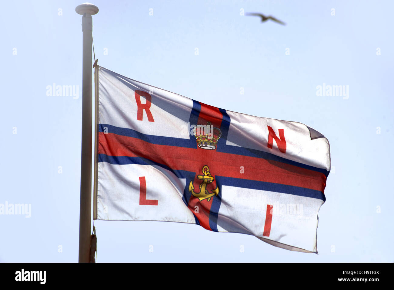 Un Institut National Royal des embarcations d'un drapeau Banque D'Images