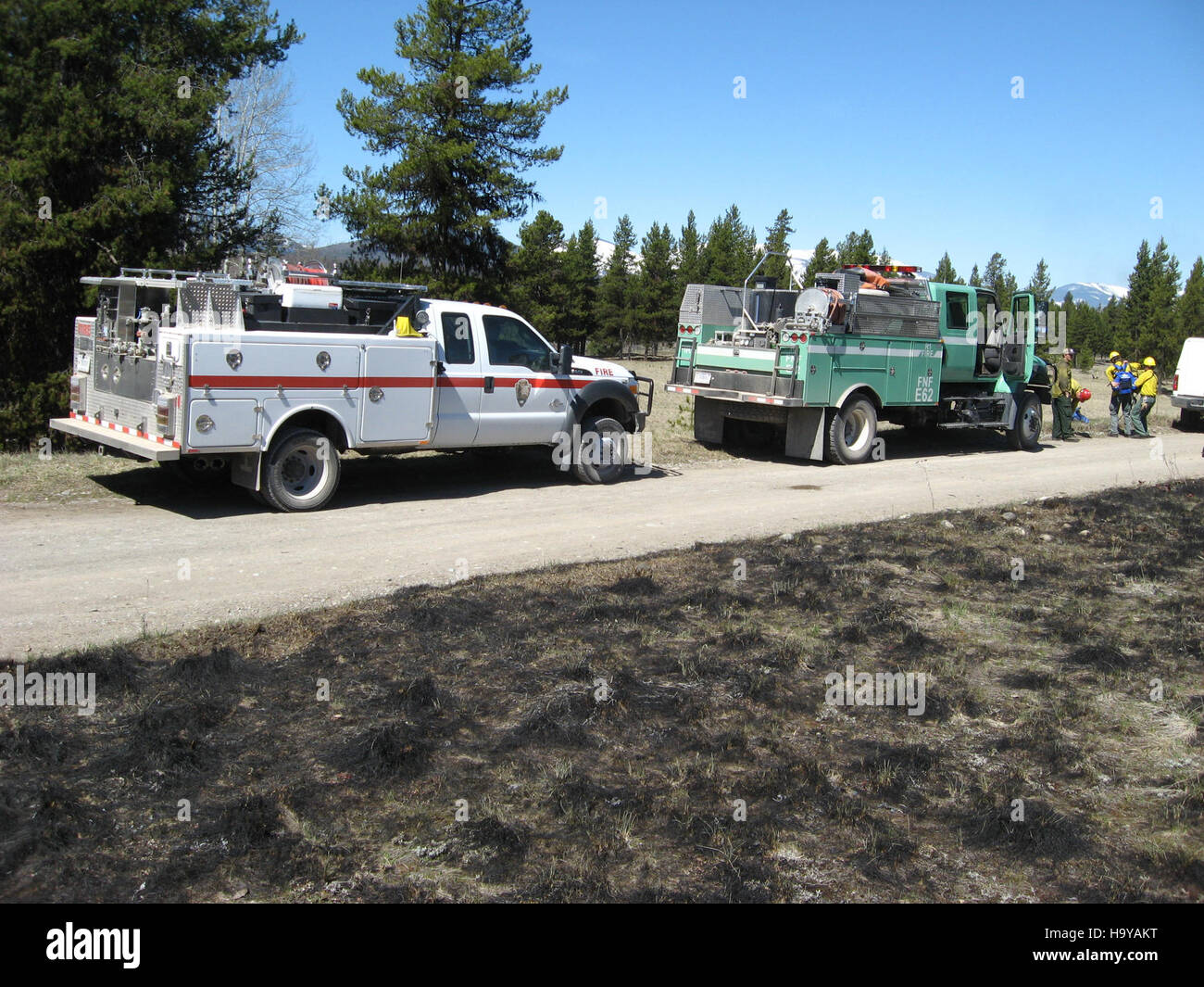 L'image capture une brûlure prescrite dans la région de Big Prairie de North Fork le 1er mai 2014. Cette technique de gestion des incendies est utilisée pour prévenir les feux de forêt plus importants et maintenir la santé de l'écosystème dans les parcs nationaux. Banque D'Images