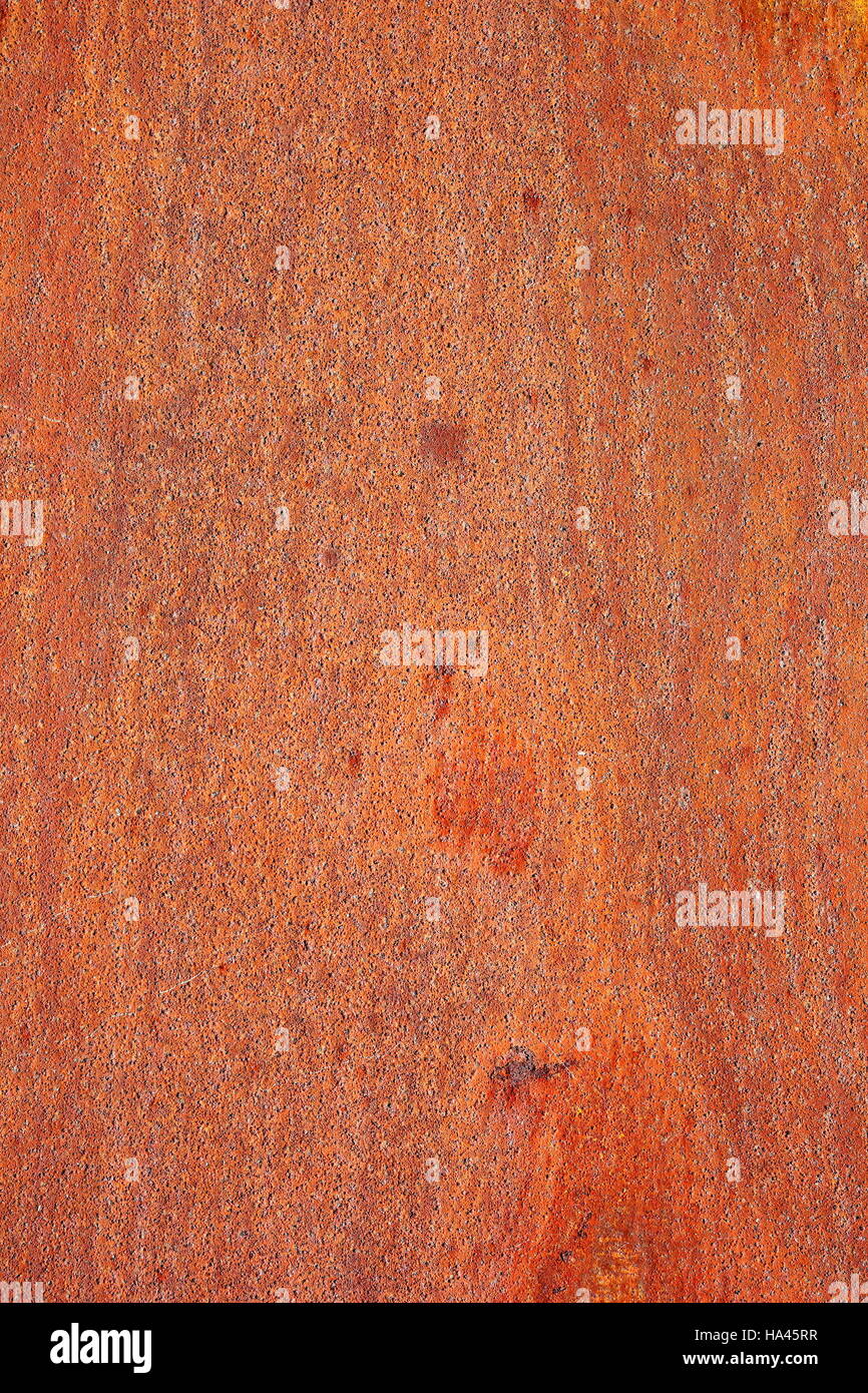 Orange sur la rouille grunge vieille surface métallique, du vrai de la texture pour votre conception Banque D'Images