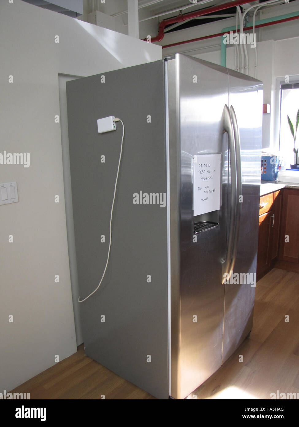 Le projet AHEM GE Brillion implique des technologies intelligentes telles que la réponse à la demande, la gestion automatisée de l'énergie et les tests de réseaux intelligents pour améliorer l'efficacité énergétique dans les bâtiments. Cette initiative représente des progrès dans les pratiques énergétiques durables. Banque D'Images