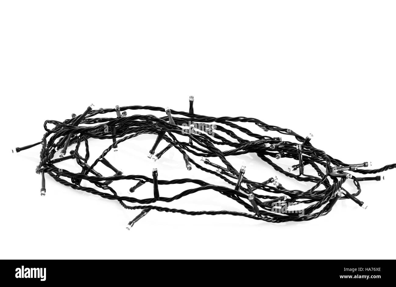 Les lumières de noël ornement corde pour arbre de Noël noir et blanc, isolé sur fond blanc Banque D'Images