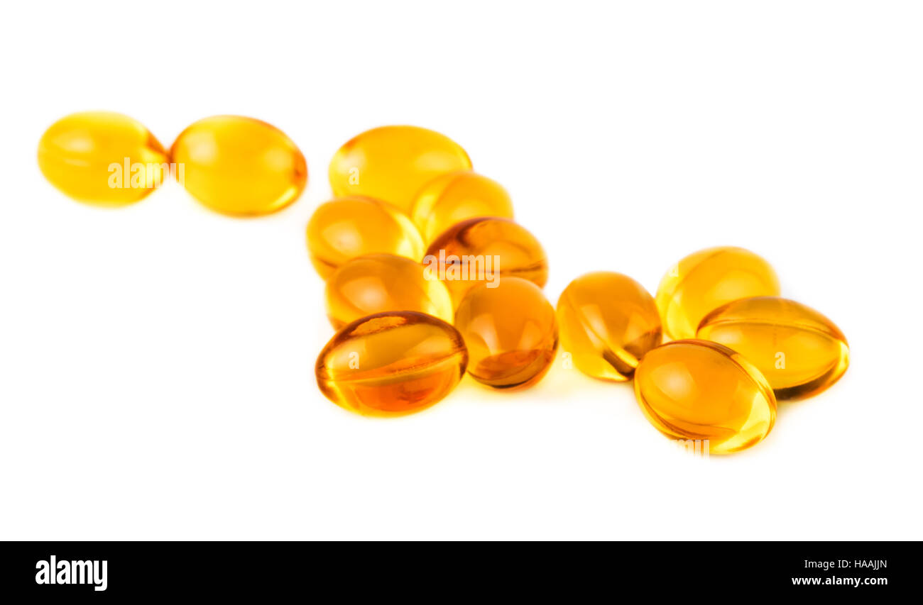 Les capsules de vitamine E on white Banque D'Images