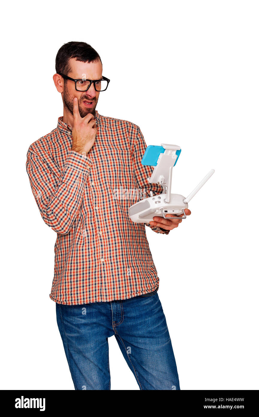 L'homme avec le vol drone. Problème. Studio shot, isolé sur fond blanc Banque D'Images