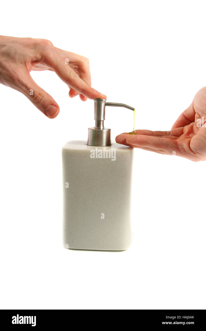 Lavage à la main : l'application de savon liquide Banque D'Images