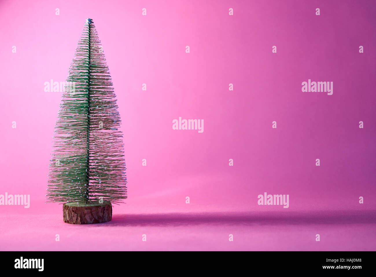Arbre de Noël sur fond rose Banque D'Images