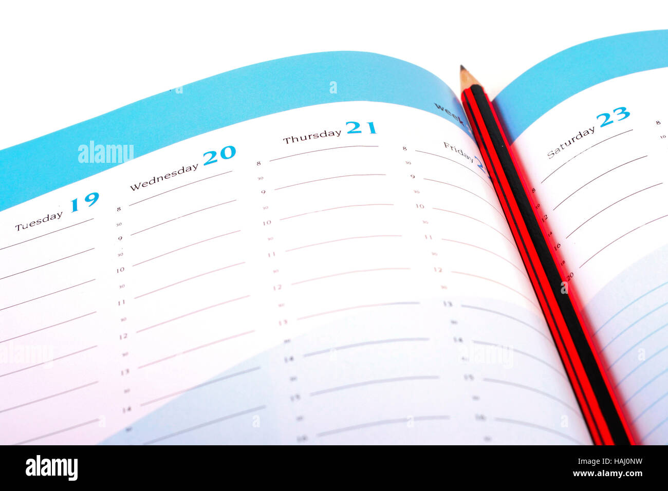 Crayon sur un calendrier Banque D'Images