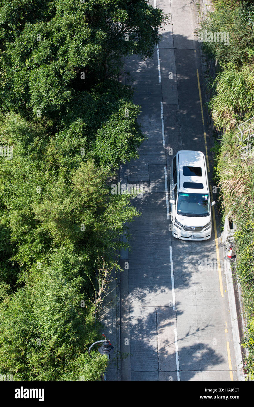 Une voiture roulant dans le Victoria Peak Hong Kong Banque D'Images
