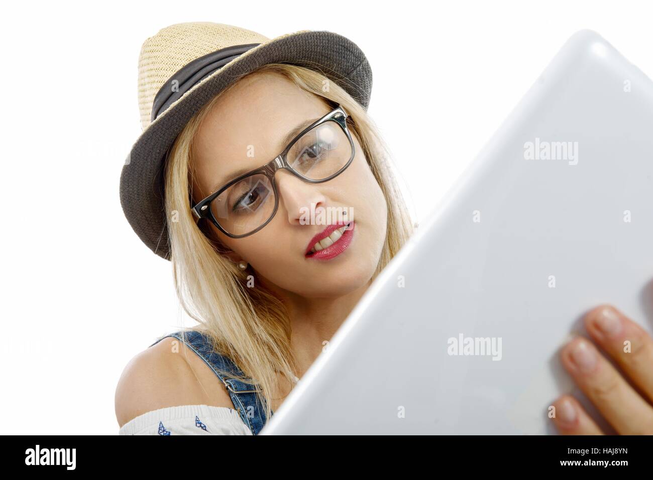 Belle blonde middle-aged woman with tablet computer Banque D'Images