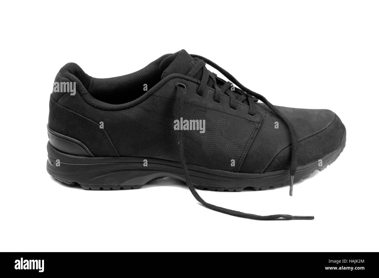 L'un des chaussures pour hommes noir. Isoler sur blanc. Banque D'Images