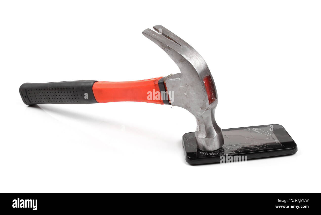 Marteau et d'un téléphone mobile avec écran cassé Banque D'Images