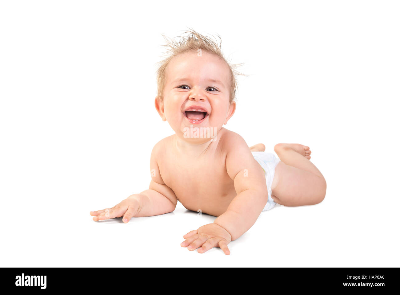 Magnifique petit garçon posant isolé en fond blanc Banque D'Images