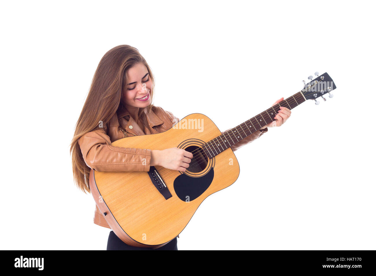 Jeune femme tenant une guitare Banque D'Images