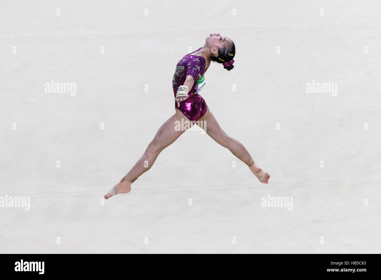 Rio de Janeiro, Brésil. 9 août 2016. Chunsong Shang (CHN) effectue l'exercice au sol à la compétition par équipe dring 2016 Jeux Olympiques d'été. ©Pau Banque D'Images