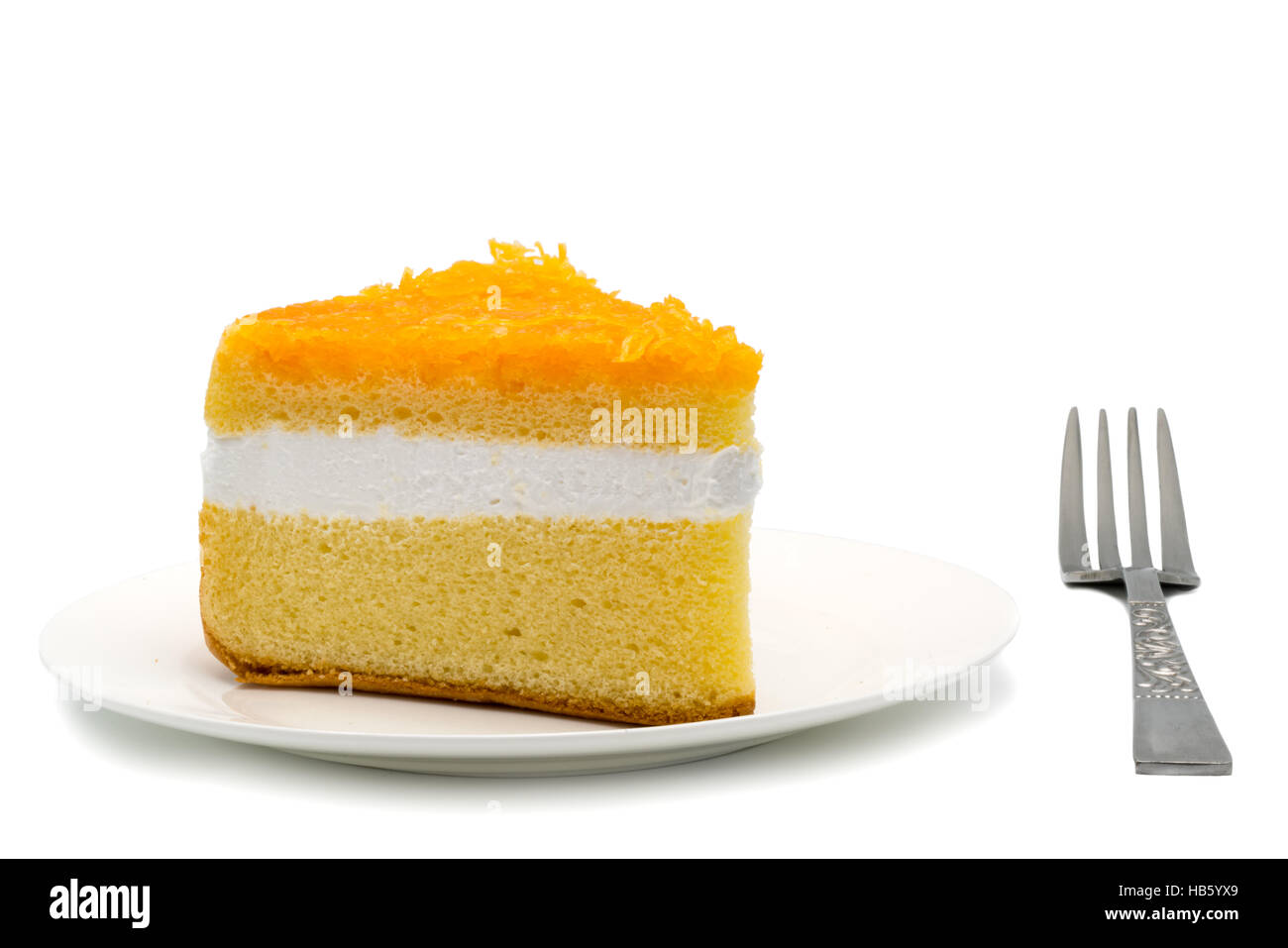 Gâteau mousseline garnie avec foi thong sur fond blanc Banque D'Images