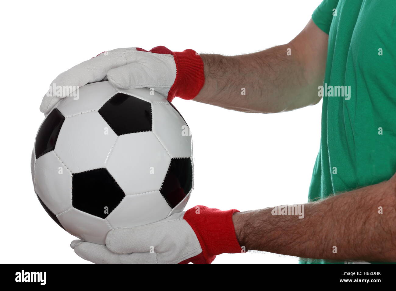 Ballon de soccer dans la main Banque D'Images