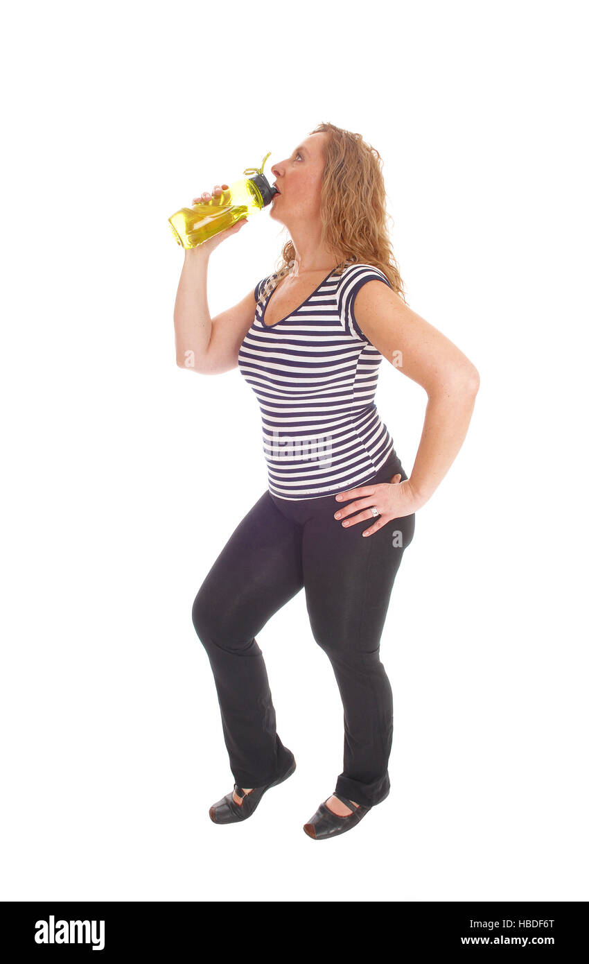 Femme d'entraînement avec sa bouteille d'eau. Banque D'Images