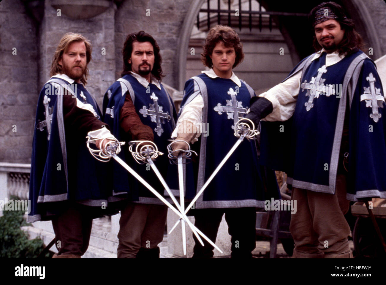 Les trois mousquetaires (1993), Kiefer Sutherland, Charlie Sheen, Chris O'Donnell & Oliver Platt. Banque D'Images