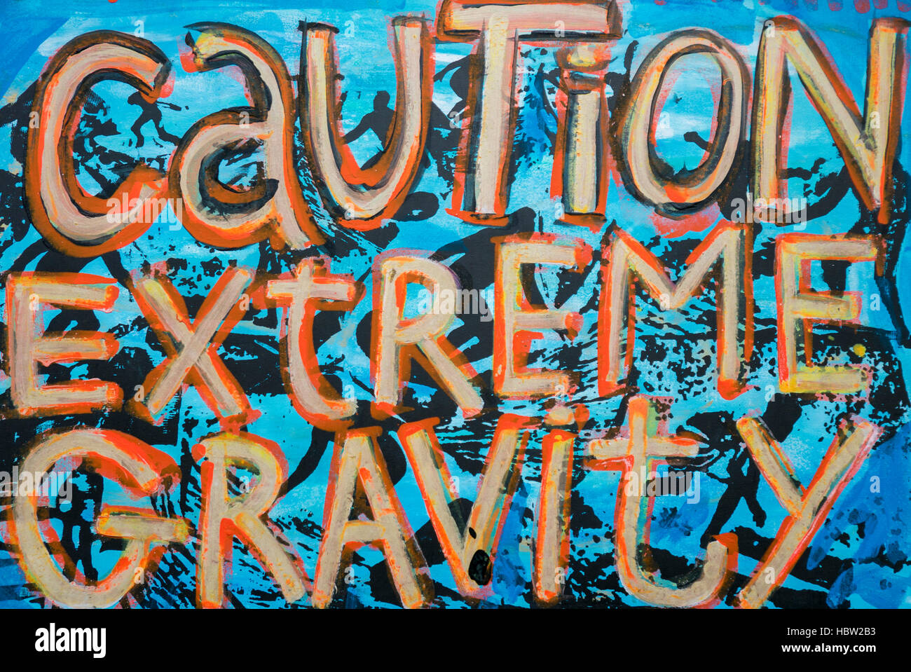 Graffitis colorés avec message "attention extrême gravité', Lovina. L'île de Bali Banque D'Images