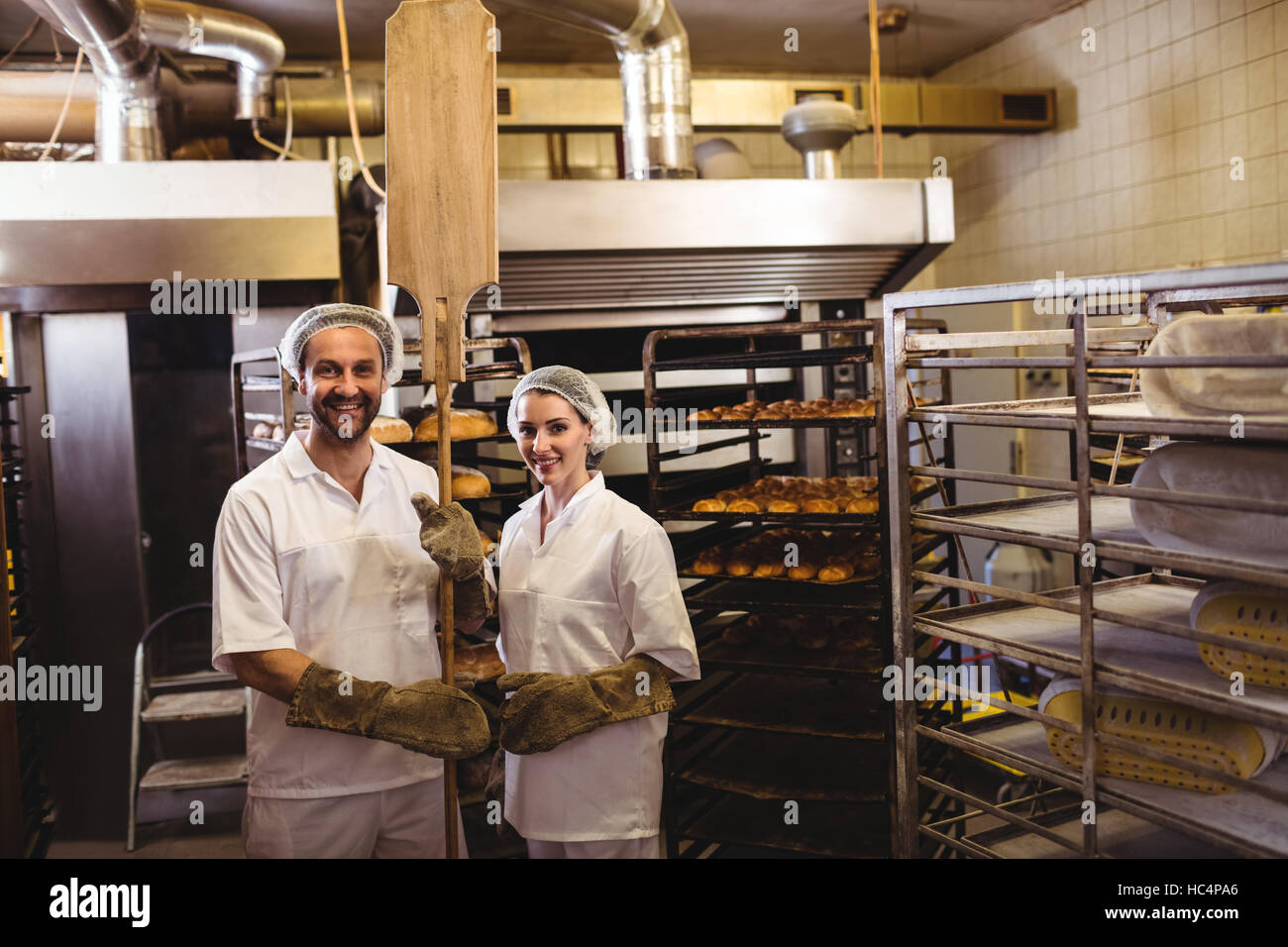 Portrait de femmes et d'hommes en baker Standing together Banque D'Images