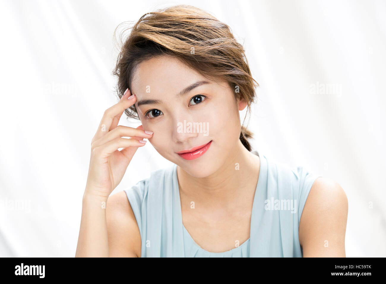 Portrait of young smiling woman Banque D'Images