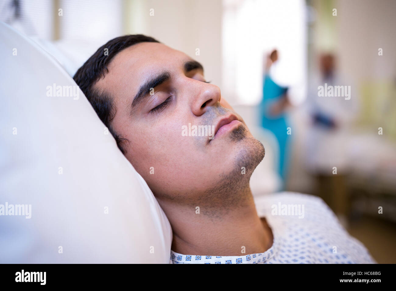 Close-up of patient on bed Banque D'Images