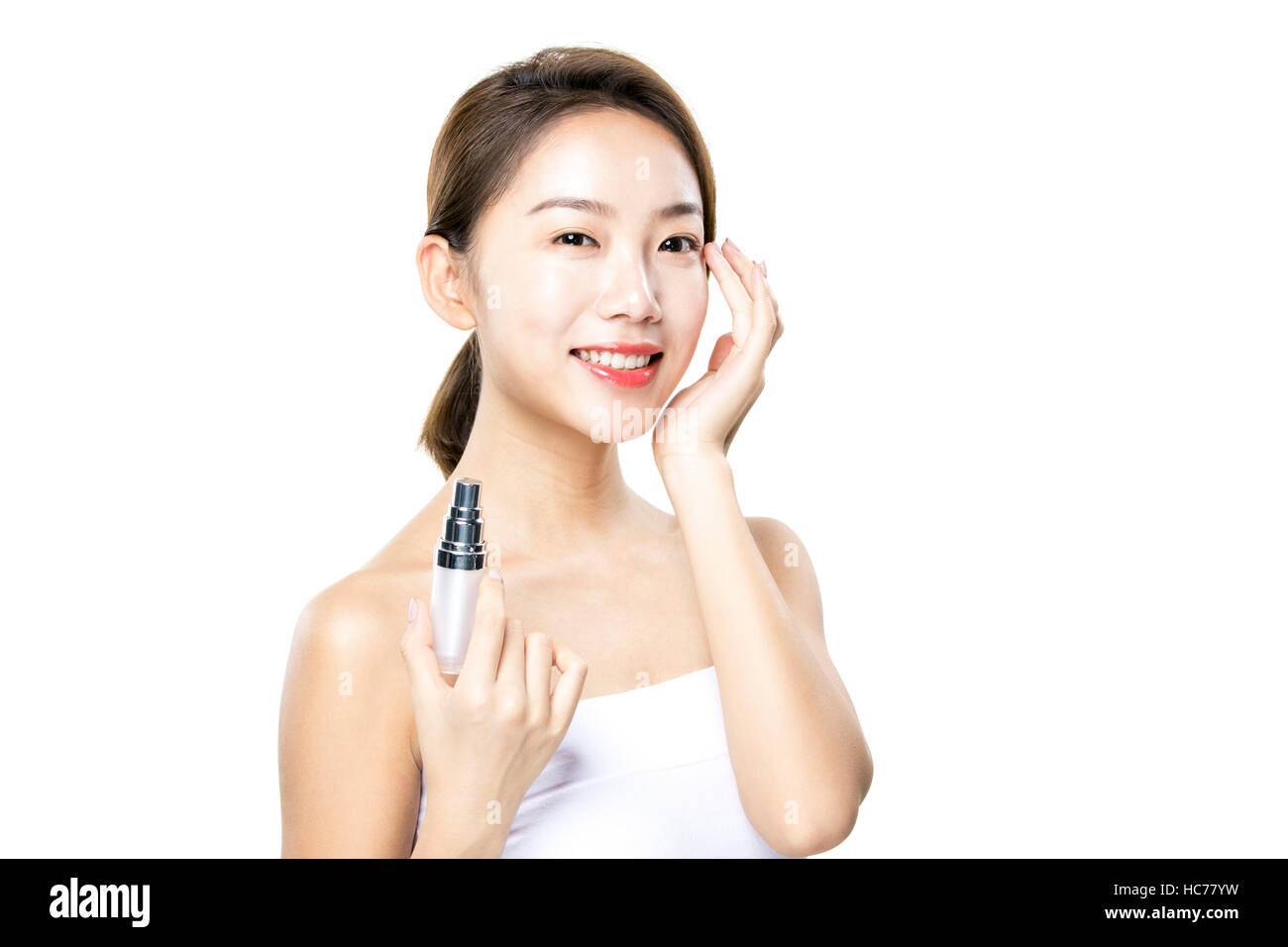 Portrait of smiling woman with cosmetic Banque D'Images