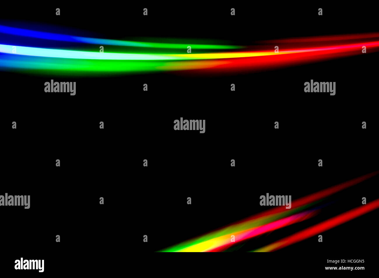 La création d'une lumière réfractée lumière Arc-en-ciel motif prismatique réfléchie par la surface d'un disque DVD Banque D'Images