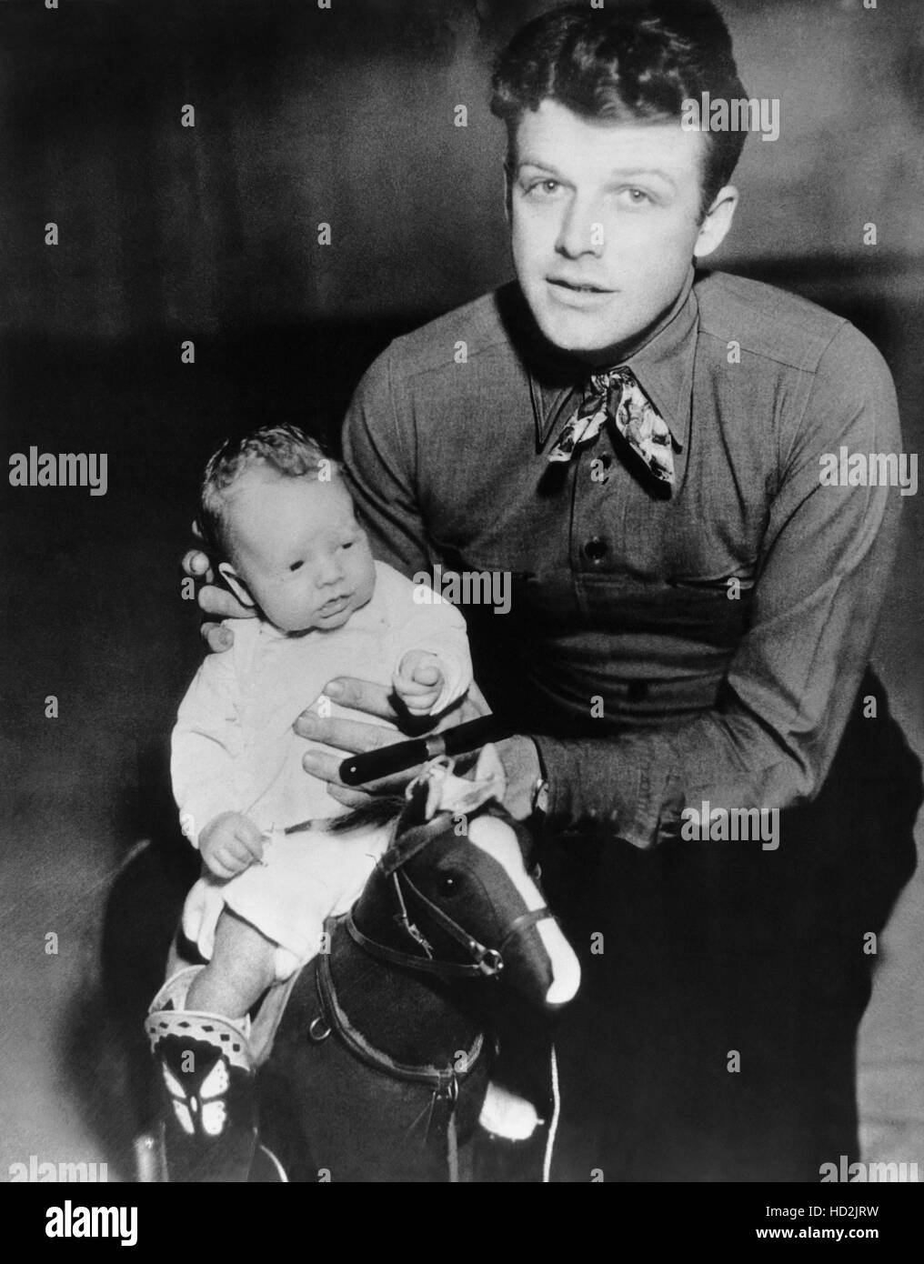 Rex Bell avec son fils Rex Bell, Jr., le 22 janvier 1935 Banque D'Images