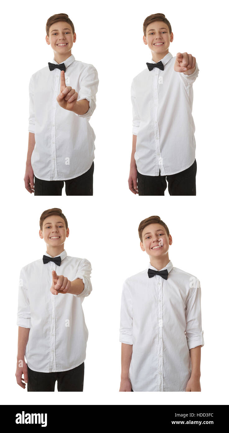 Cute adolescent garçon en chemise blanche et noeud papillon noir poussant  quelque chose devant lui-même sur fond blanc fond isolé, moitié du corps  Photo Stock - Alamy