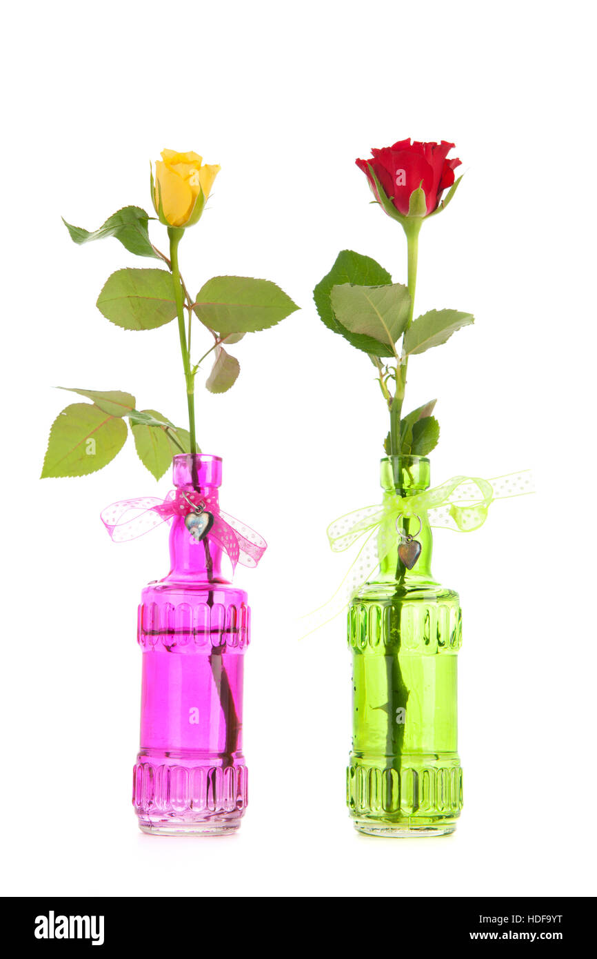 Unique dans peu colorés roses vases en verre Banque D'Images