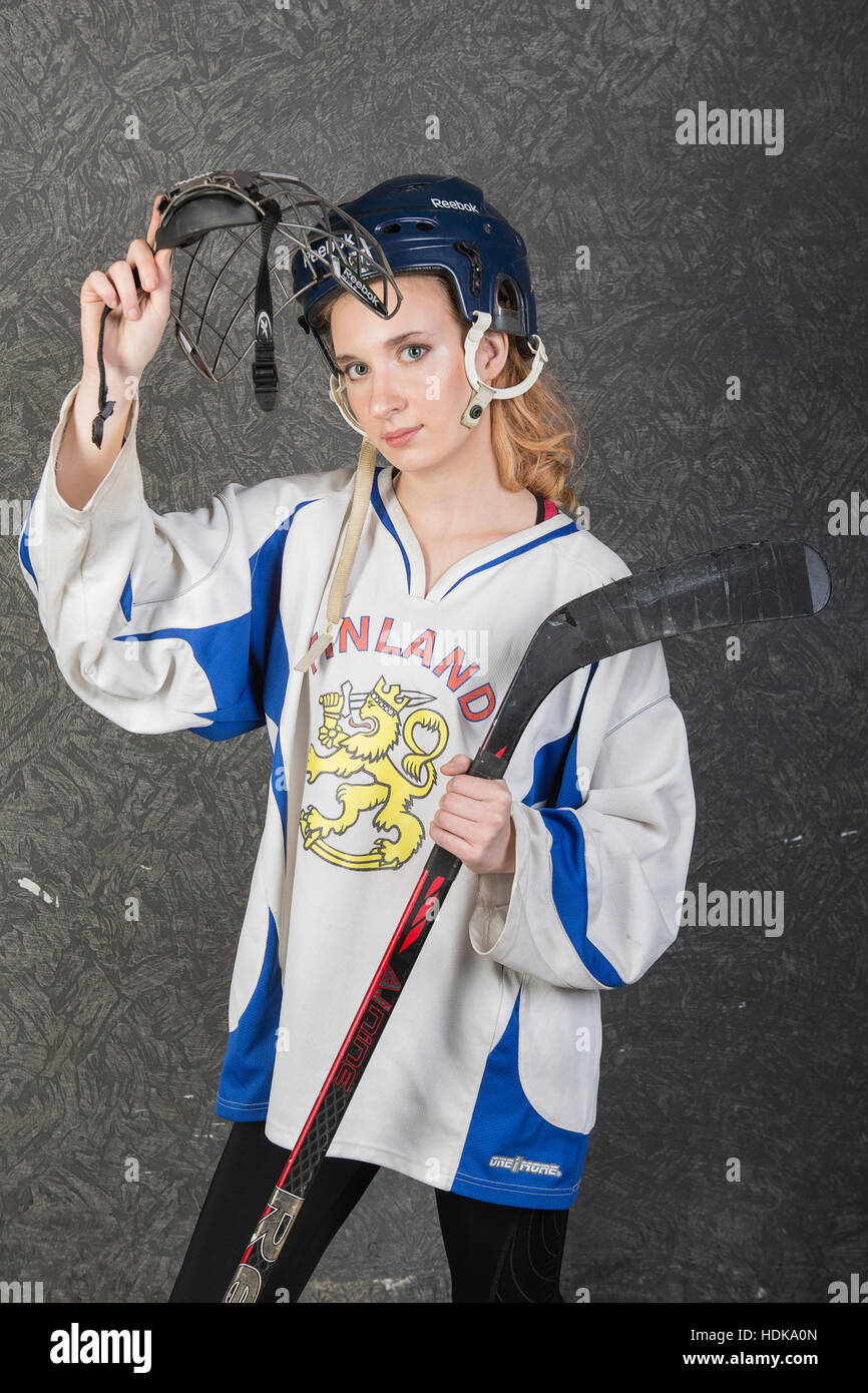 Robe fille en hockey hockey player Banque D'Images
