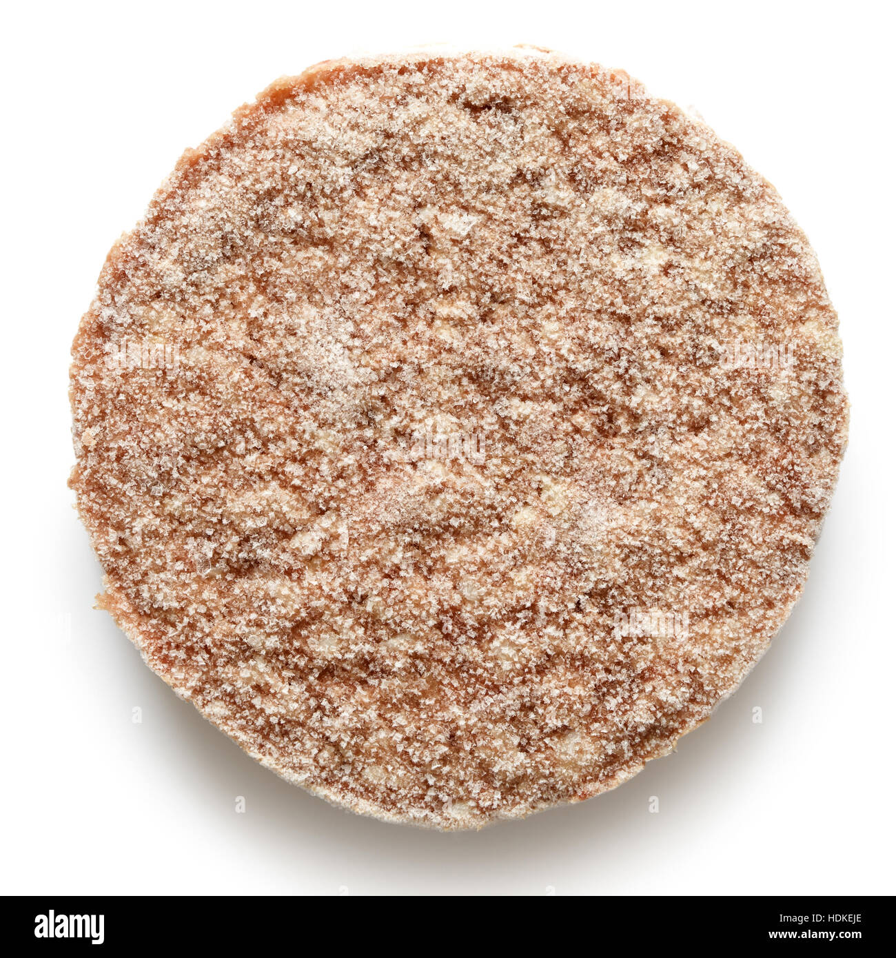 Seul hamburger congelé patty isolé sur blanc de ci-dessus. Banque D'Images Seul hamburger congelé patty isolé sur blanc de ci-dessus. Banque D'Images