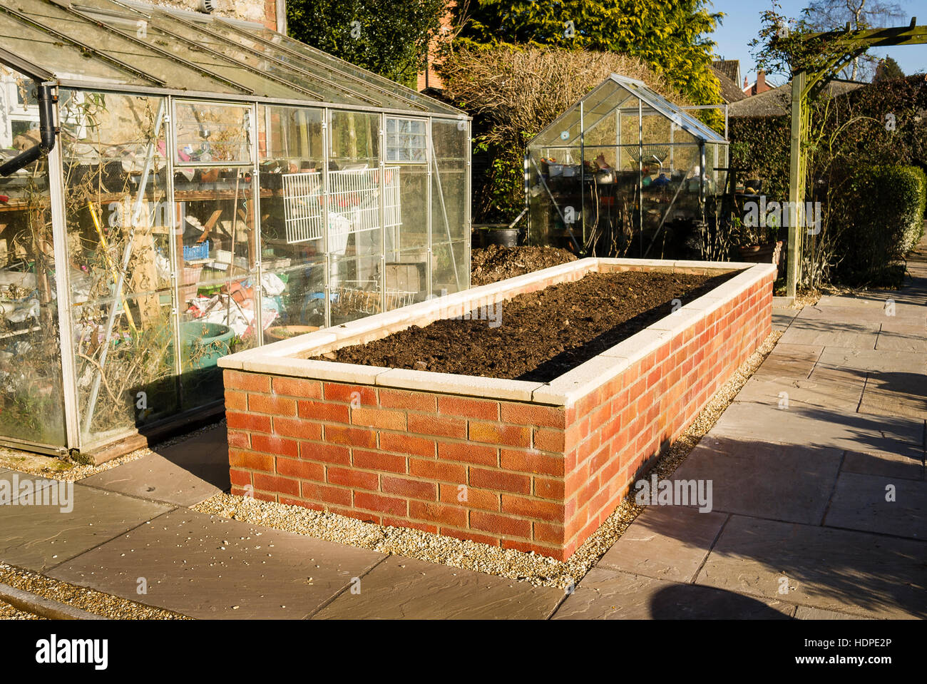 Nouveau semoir brique posée à simplifier le jardinage pour les retraités Banque D'Images