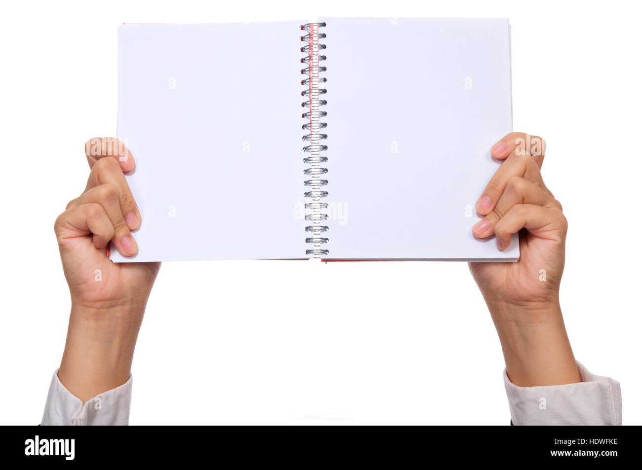 Business Woman hold blank notebook isolated over white background. Vous pouvez mettre votre message sur le papier Banque D'Images