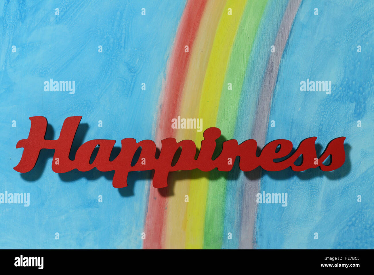 L'orthographe des lettres rouges le mot bonheur pour illustrer le concept de joie, heureux, l'amour et le bien-être, Close up. Banque D'Images