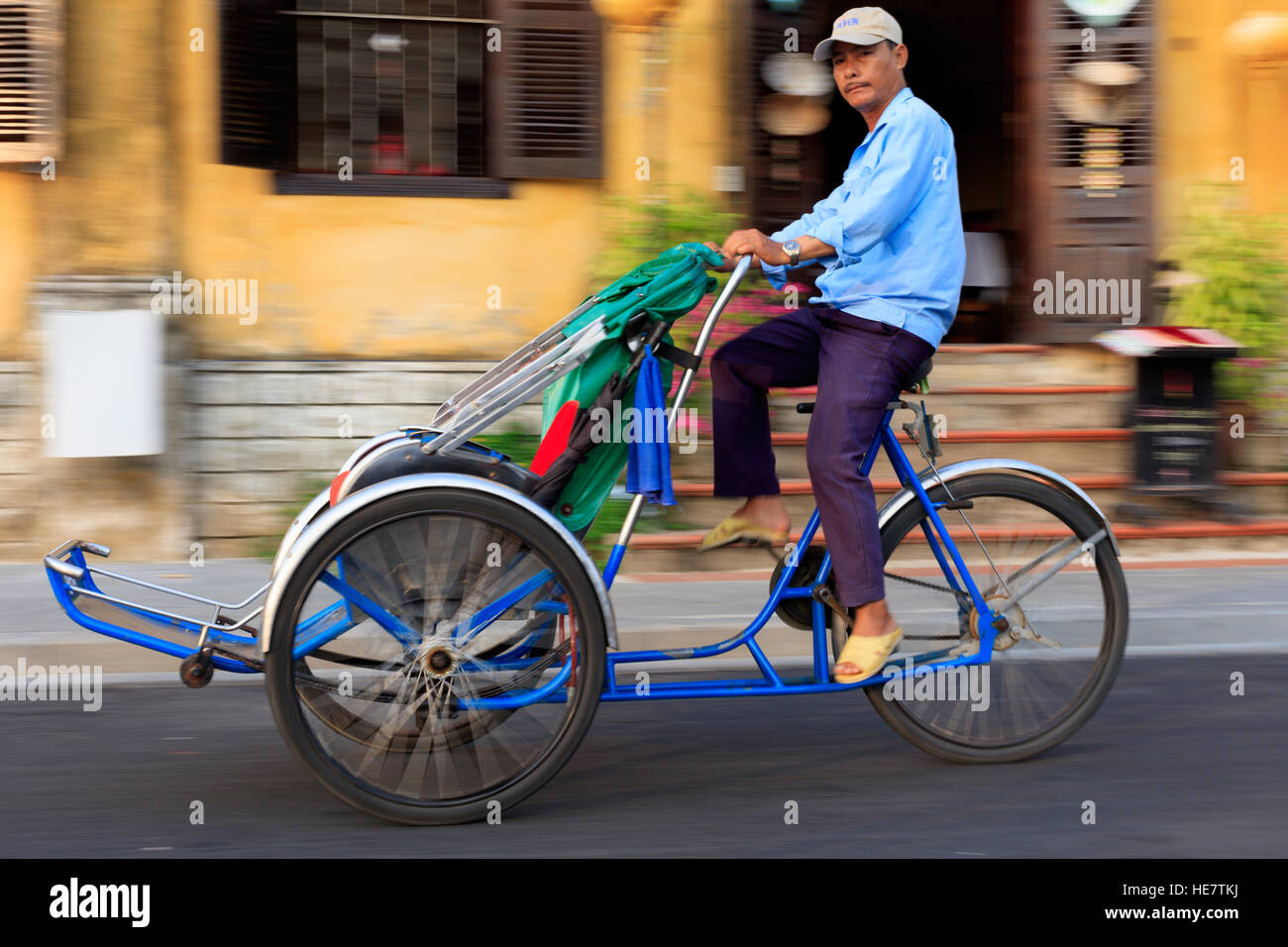 Pilote Cyclo à Hoi An Banque D'Images