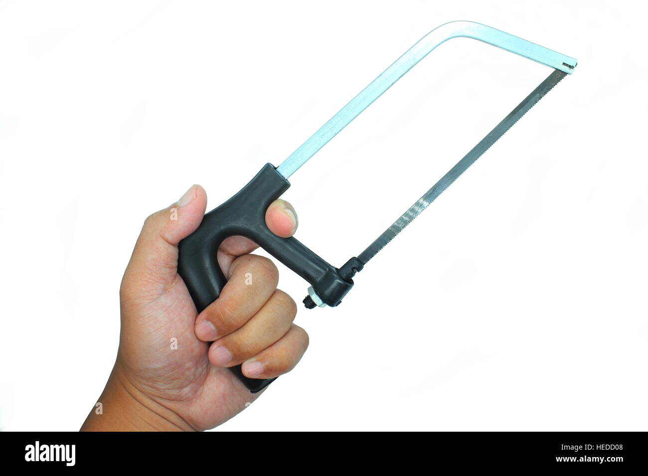 Tenant une petite scie à main isolé sur fond blanc Banque D'Images