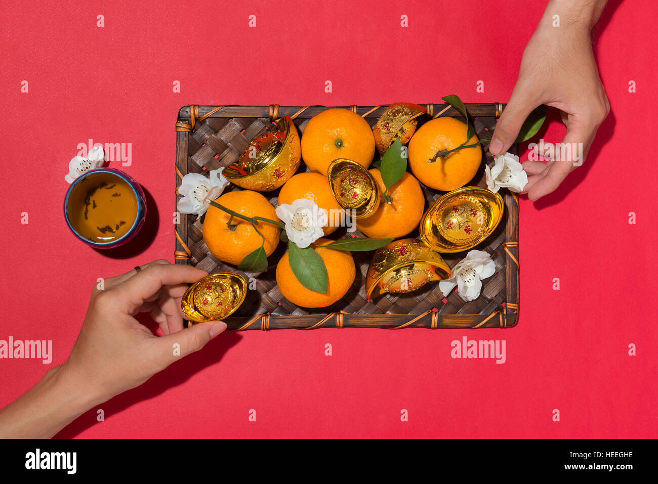 La décoration du nouvel an chinois. Sycee Mandarin orange et or. Banque D'Images