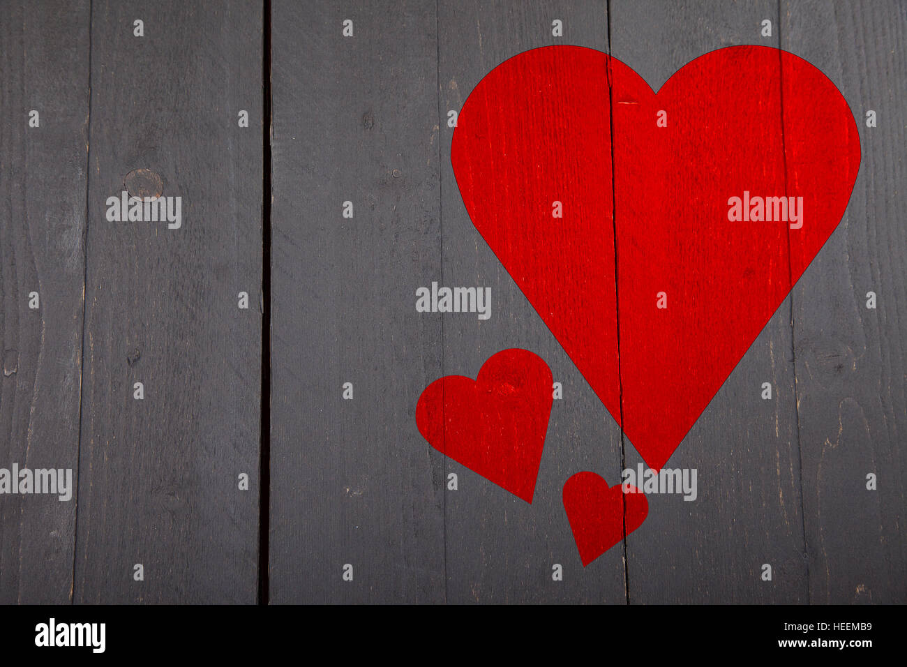 Illustration de cœur rouge sur fond de bois Banque D'Images