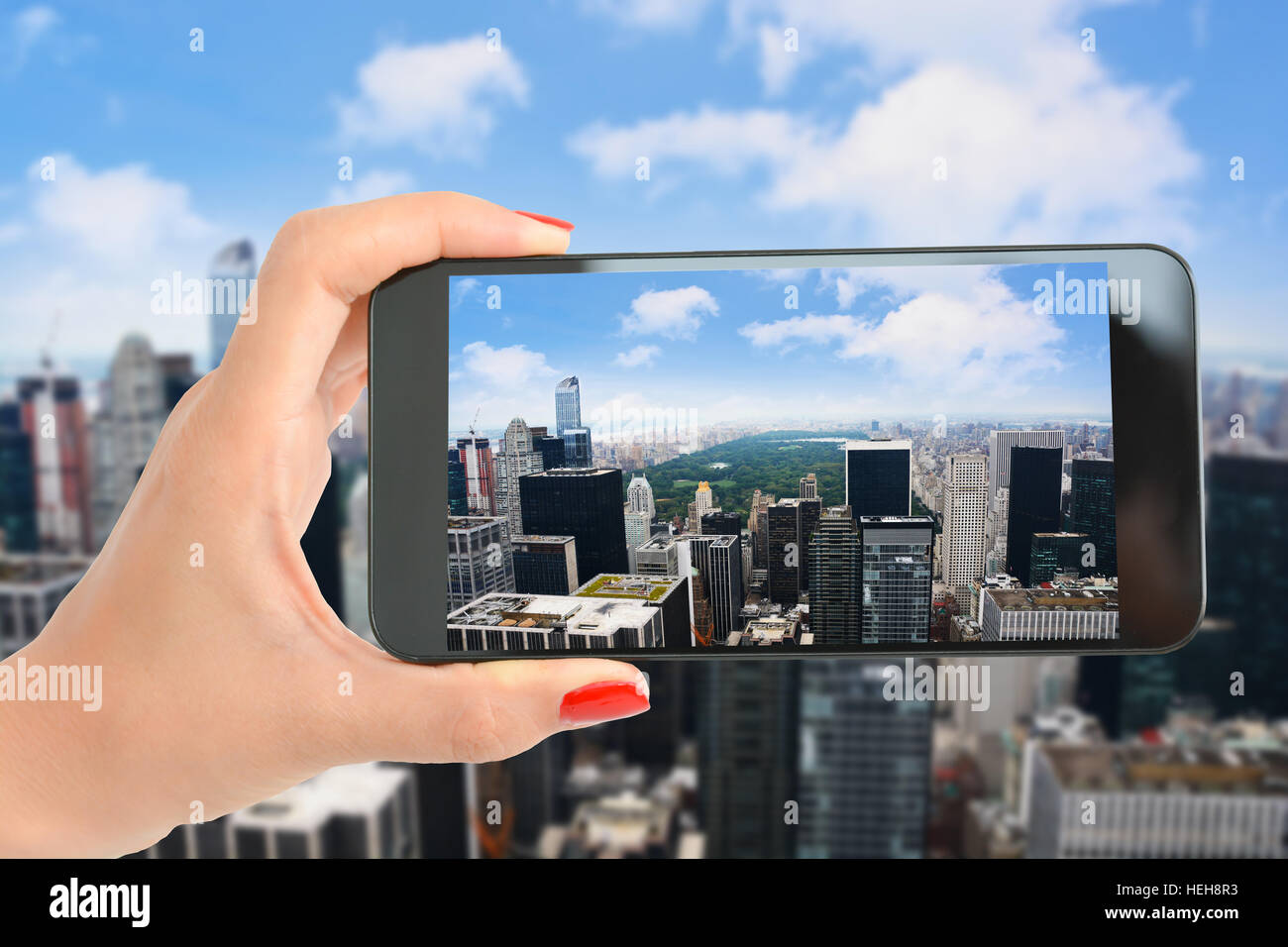 Prendre une photo de tourisme la vue sur Central Park - Manhattan, New York d'un gratte-ciel Banque D'Images Prendre une photo de tourisme la vue sur Central Park - Manhattan, New York d'un gratte-ciel Banque D'Images