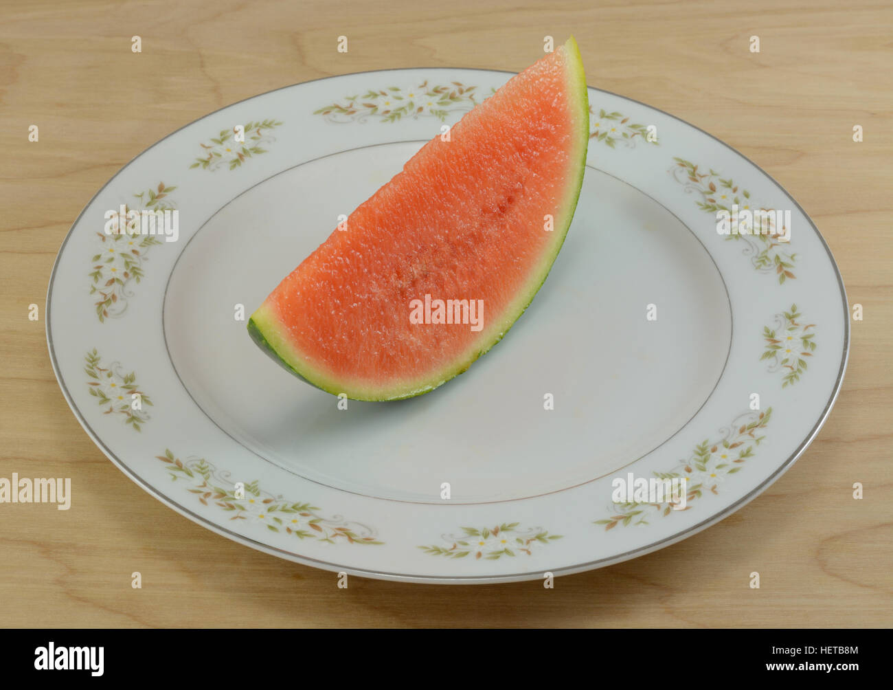 Tranche de raisins watemelon on white plate Banque D'Images