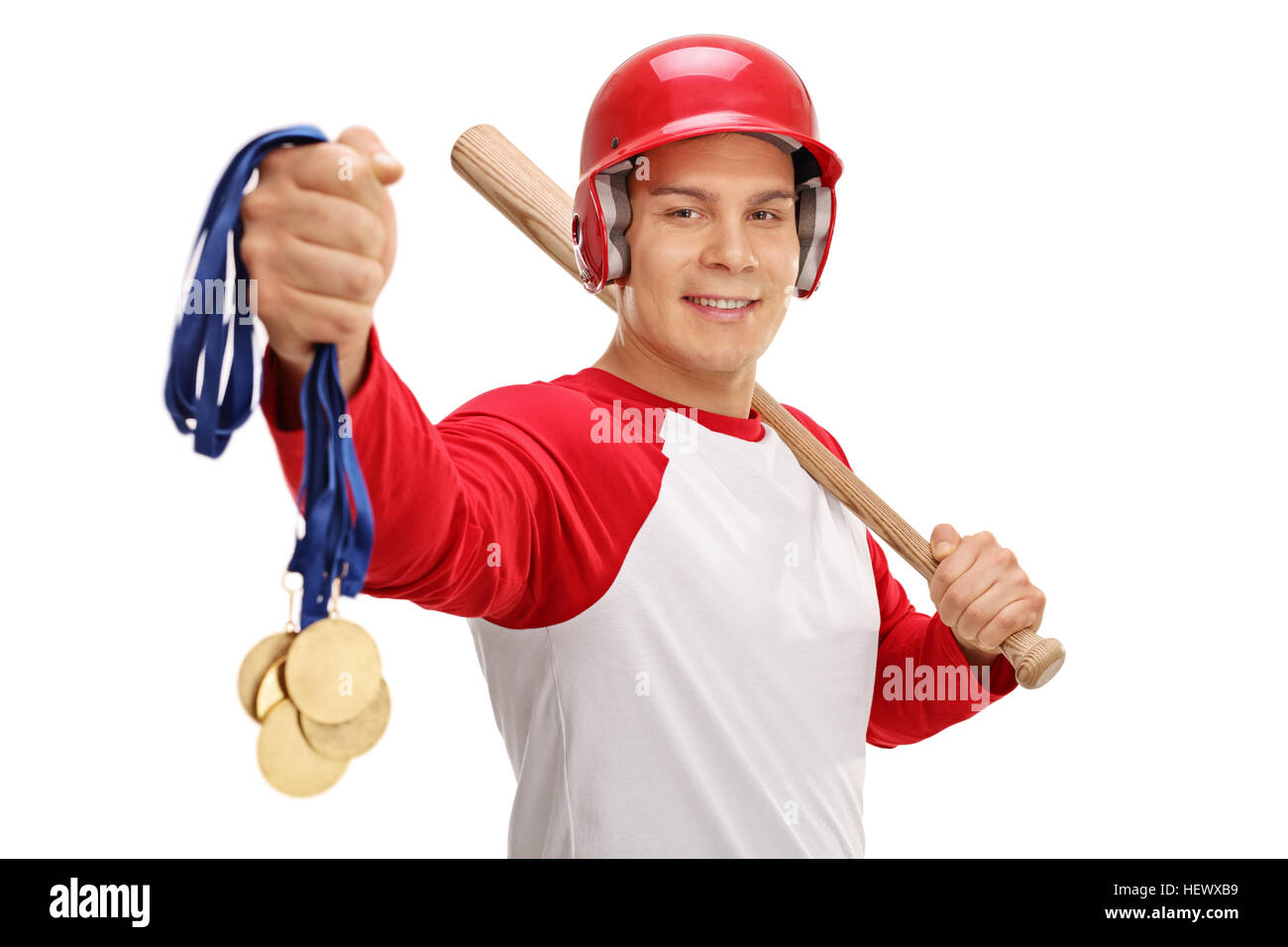 Baseball player holding médailles d'or et une chauve-souris isolé sur fond blanc Banque D'Images