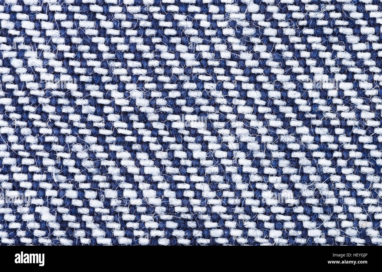 Textiles Denim macro photo. Surface de coton robuste tissu courbure - fait face. Banque D'Images
