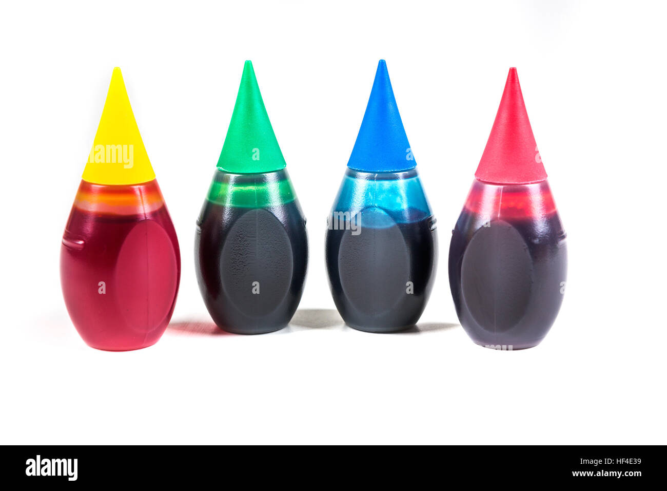 4 flacons de colorant alimentaire isolé sur fond blanc Banque D'Images